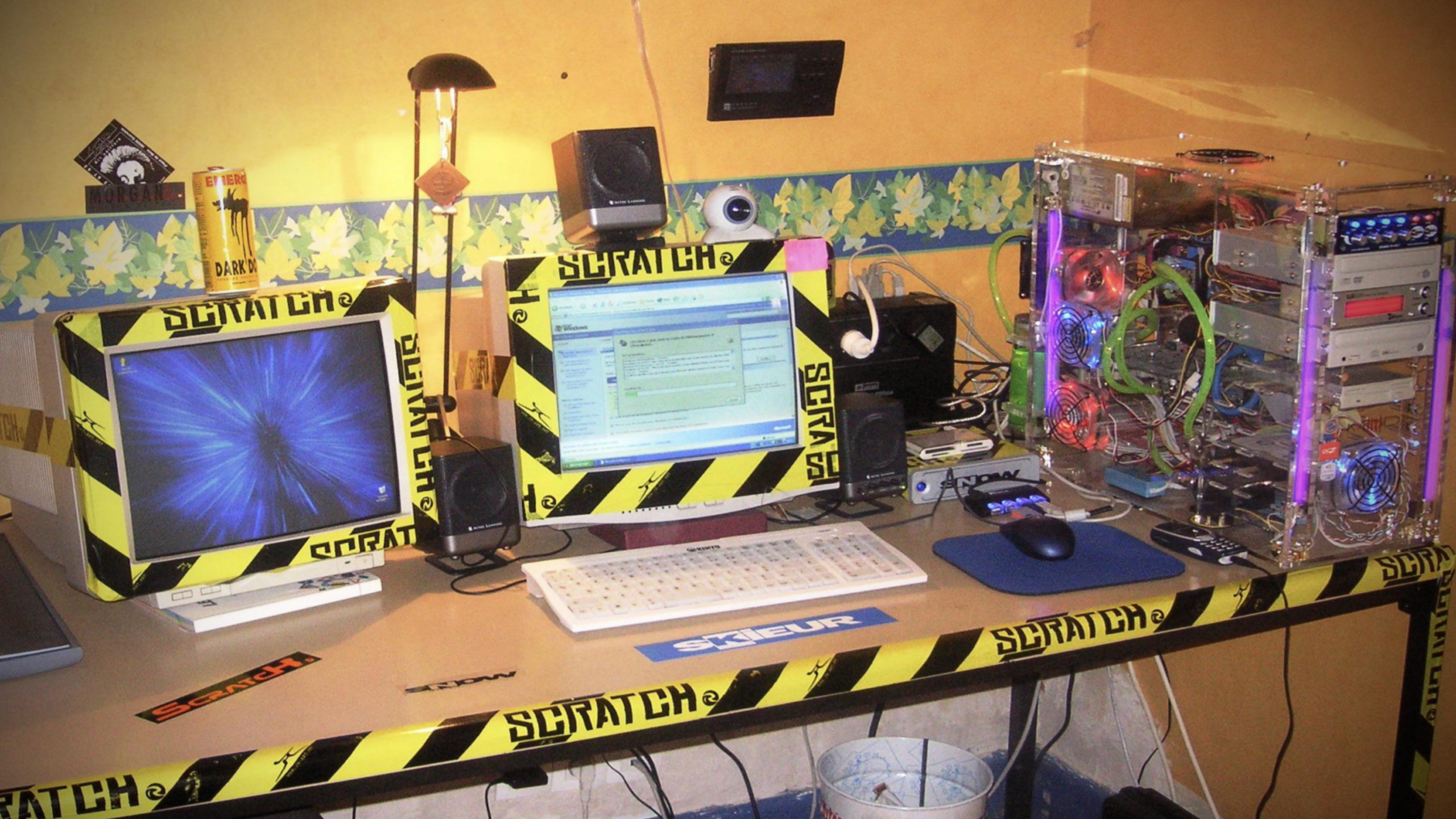 gaming custom pc setup 2000s neon lights transparent case dual monitor nostalgic