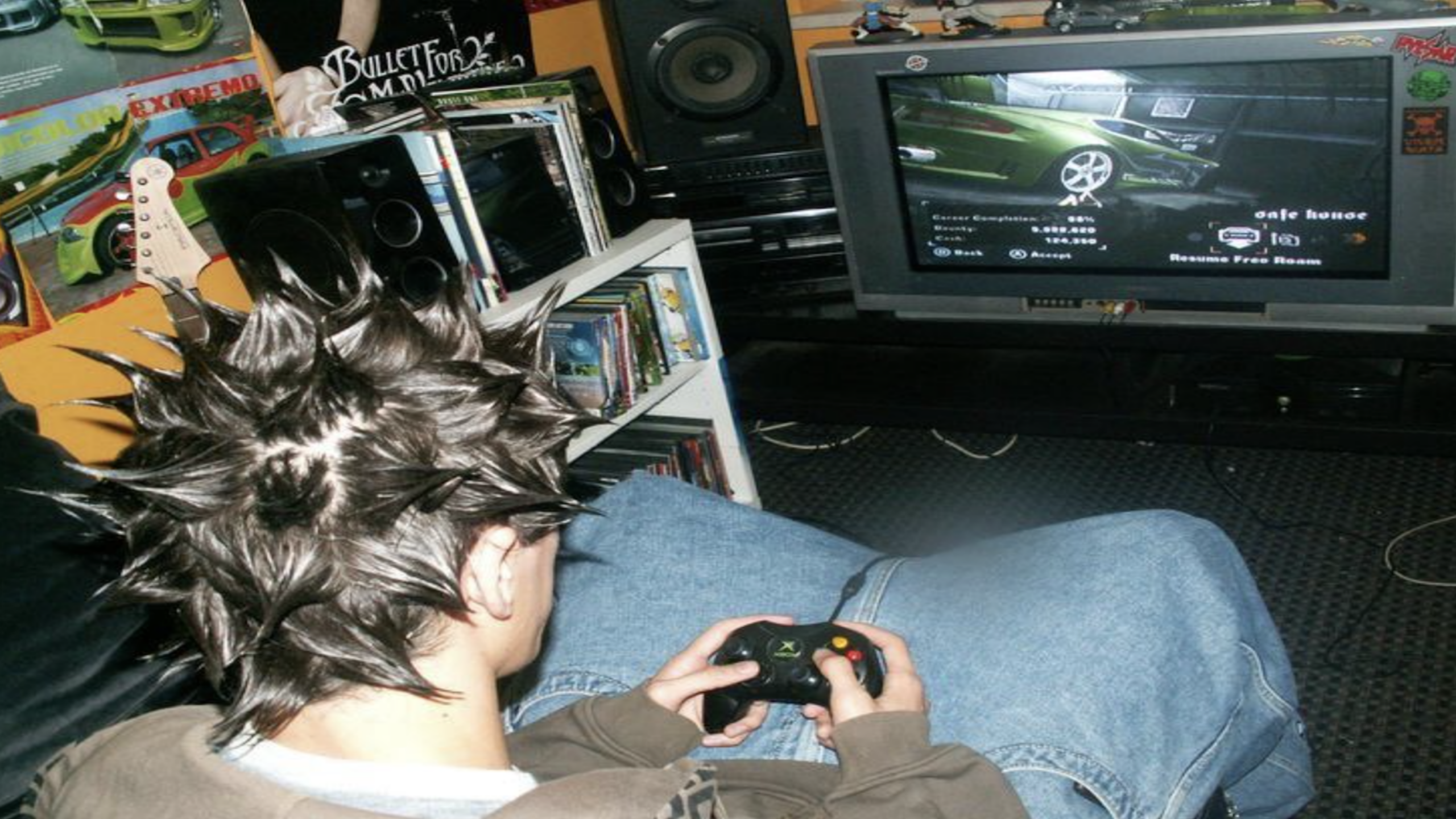 gaming 2000s console tv kid playing controller nostalgic living room setup