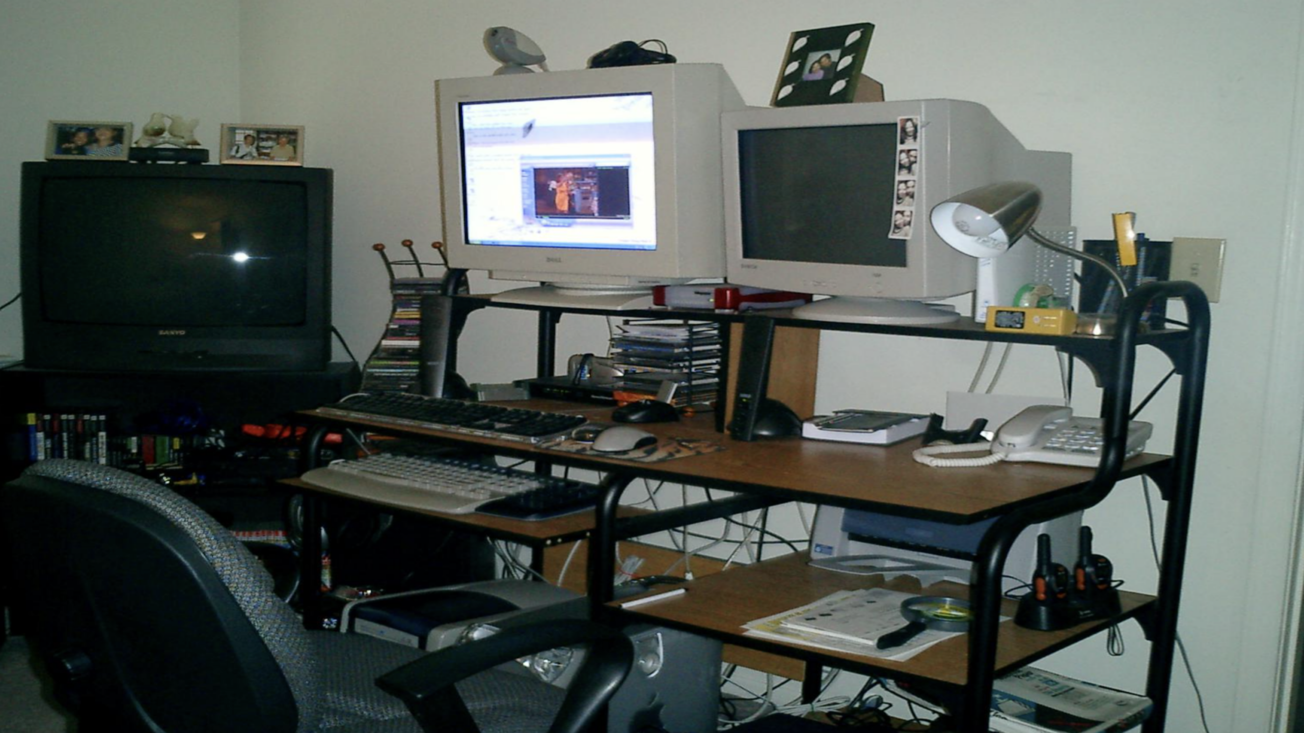 early 2000s desk dual monitors CRT TV cluttered setup home room