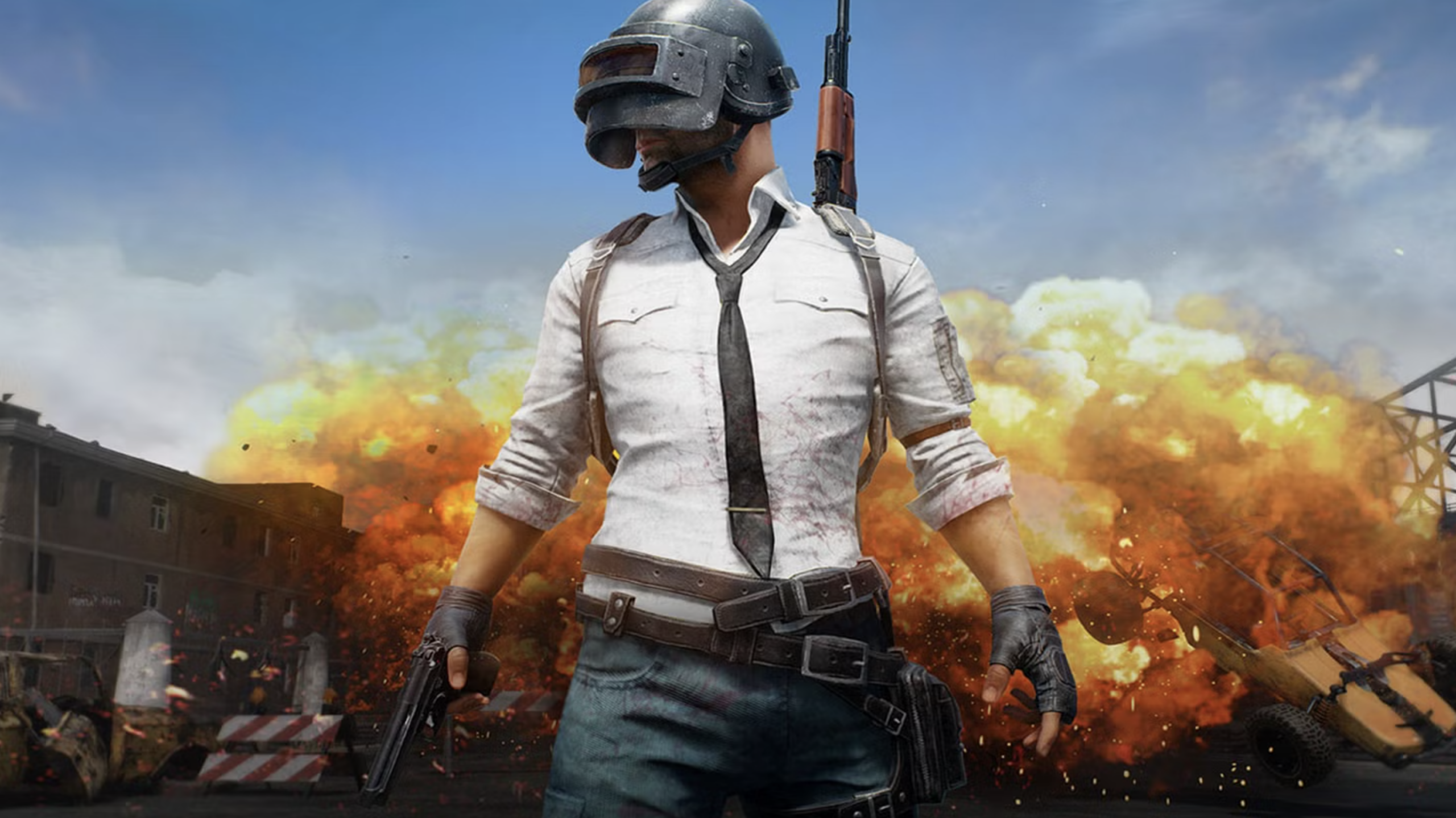 PUBG Mobile battle royale gameplay with player aiming in combat zone