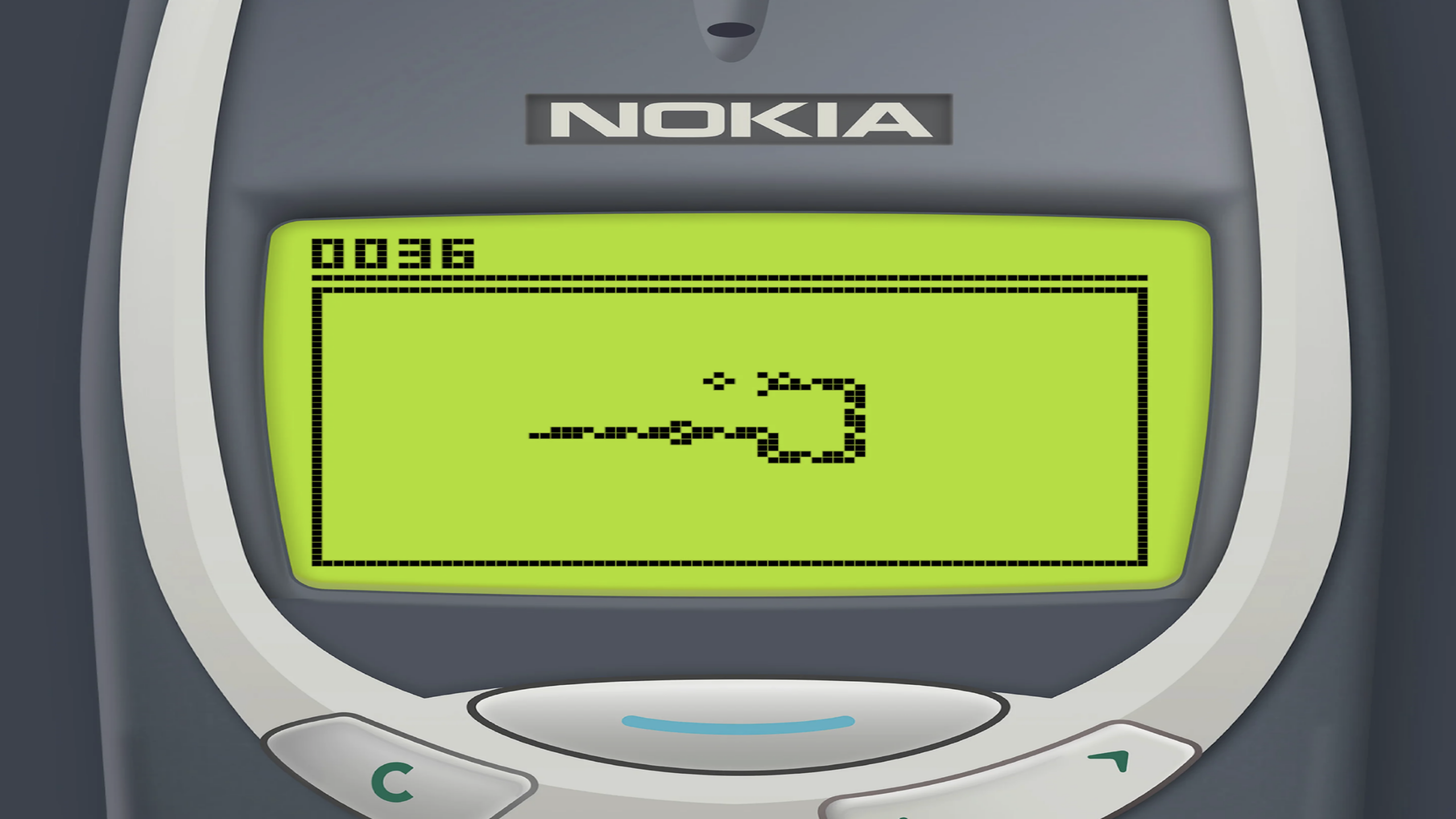 8 Snake mobile game on classic Nokia phone with growing pixel line gameplay