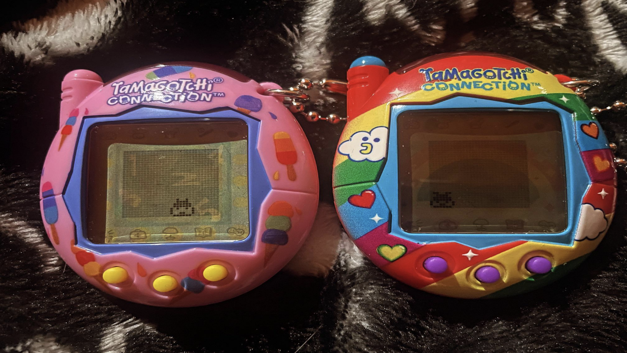 8 Tamagotchi virtual pet device with pixel screen and nostalgic keychain design