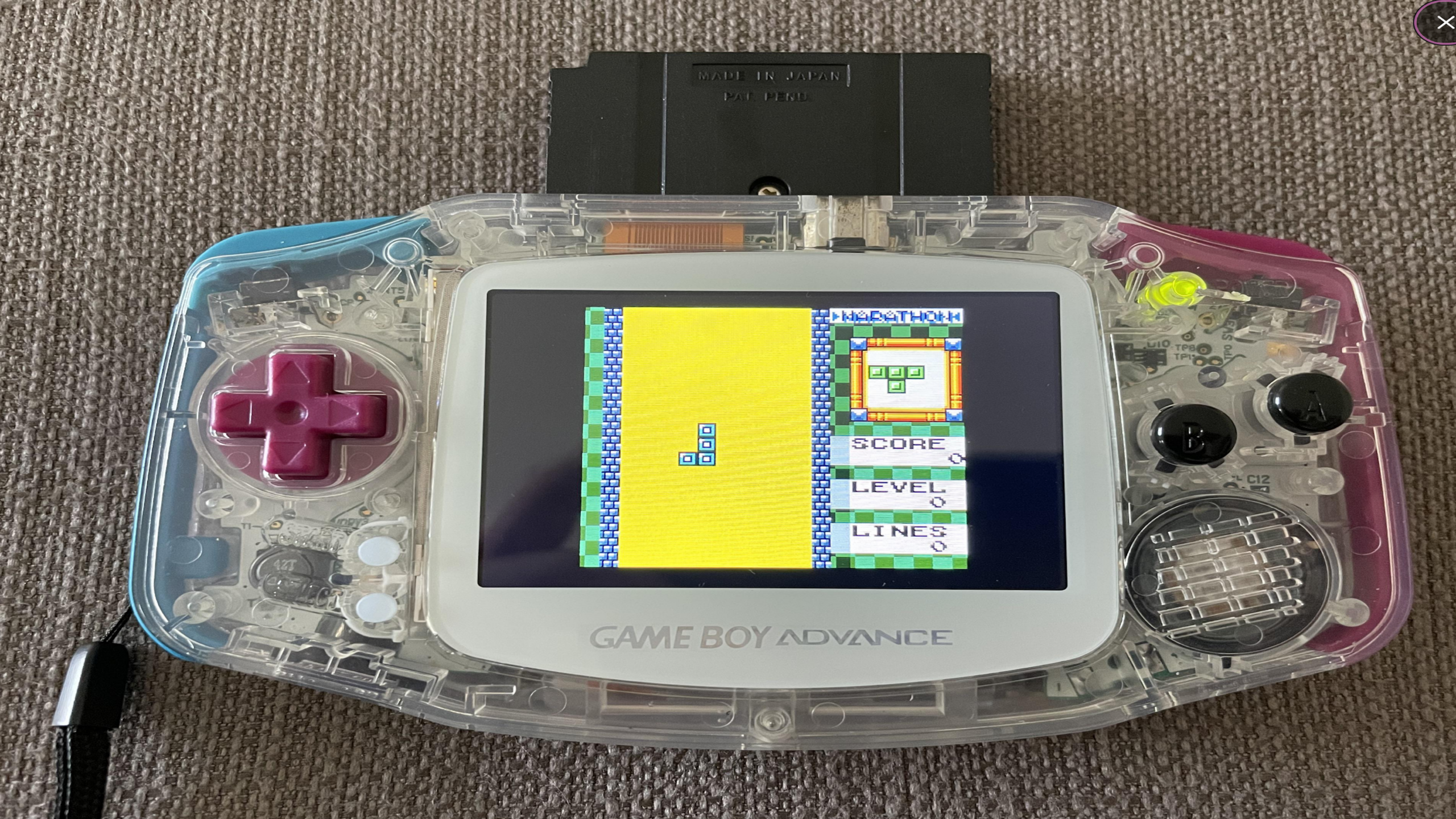 8 classic Tetris gameplay blocks falling in a retro puzzle game environment