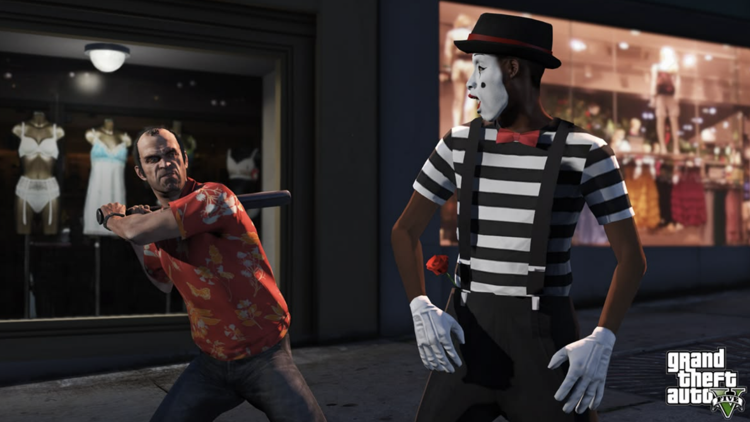 A man in a red floral shirt raises a bat at a mime in black-and-white stripes on a city street at night, evoking the chaotic energy of GTA VI. Lingerie is displayed in a store window behind them. The Grand Theft Auto V logo is in the corner.