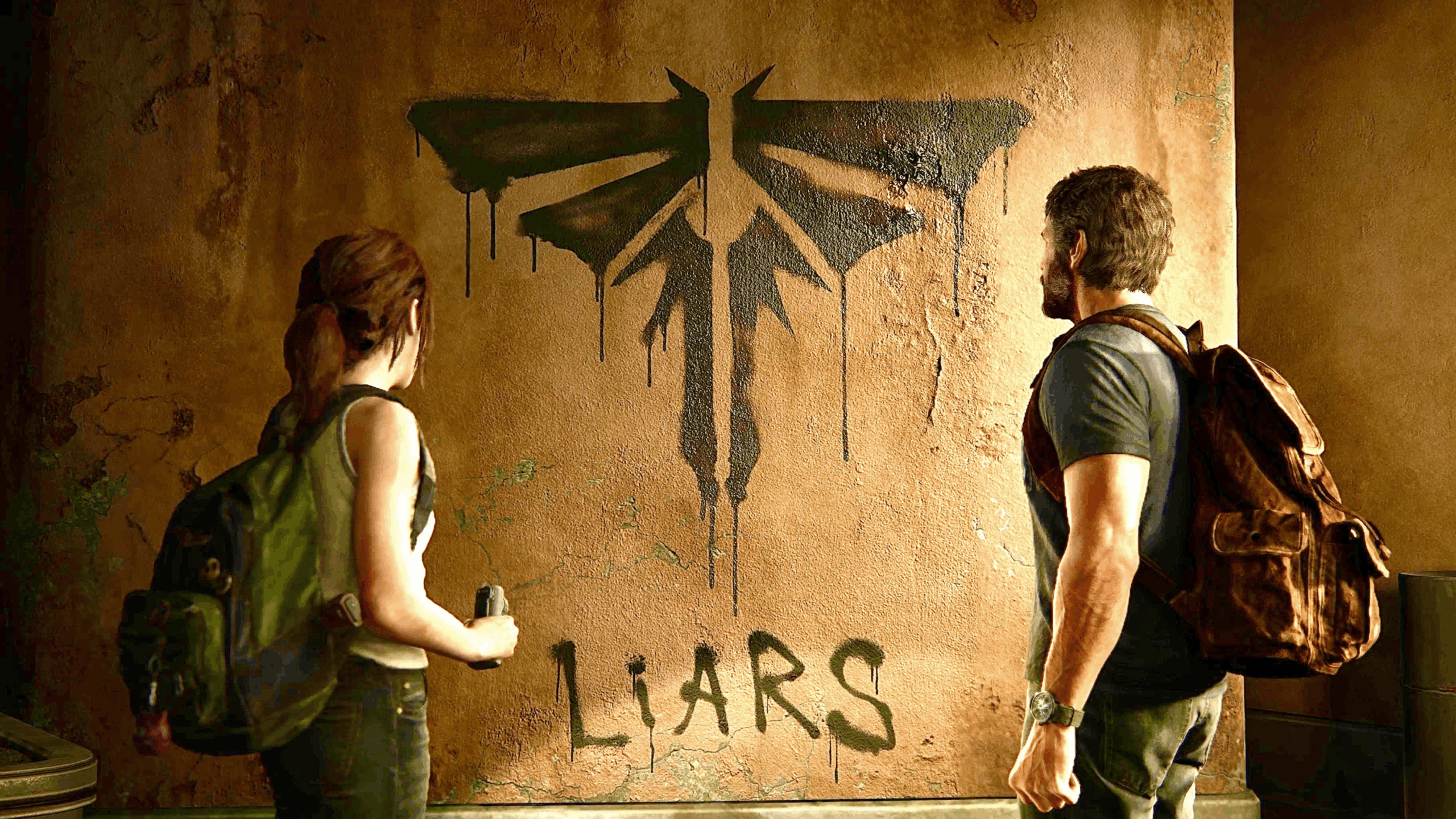 Two people with backpacks stand facing a wall with a black, spray-painted firefly symbol above the word “LIARS,” both looking at the graffiti. The tense, dramatic atmosphere feels reminiscent of scenes often encountered in Physical Games, where confrontation and discovery heighten emotions.
