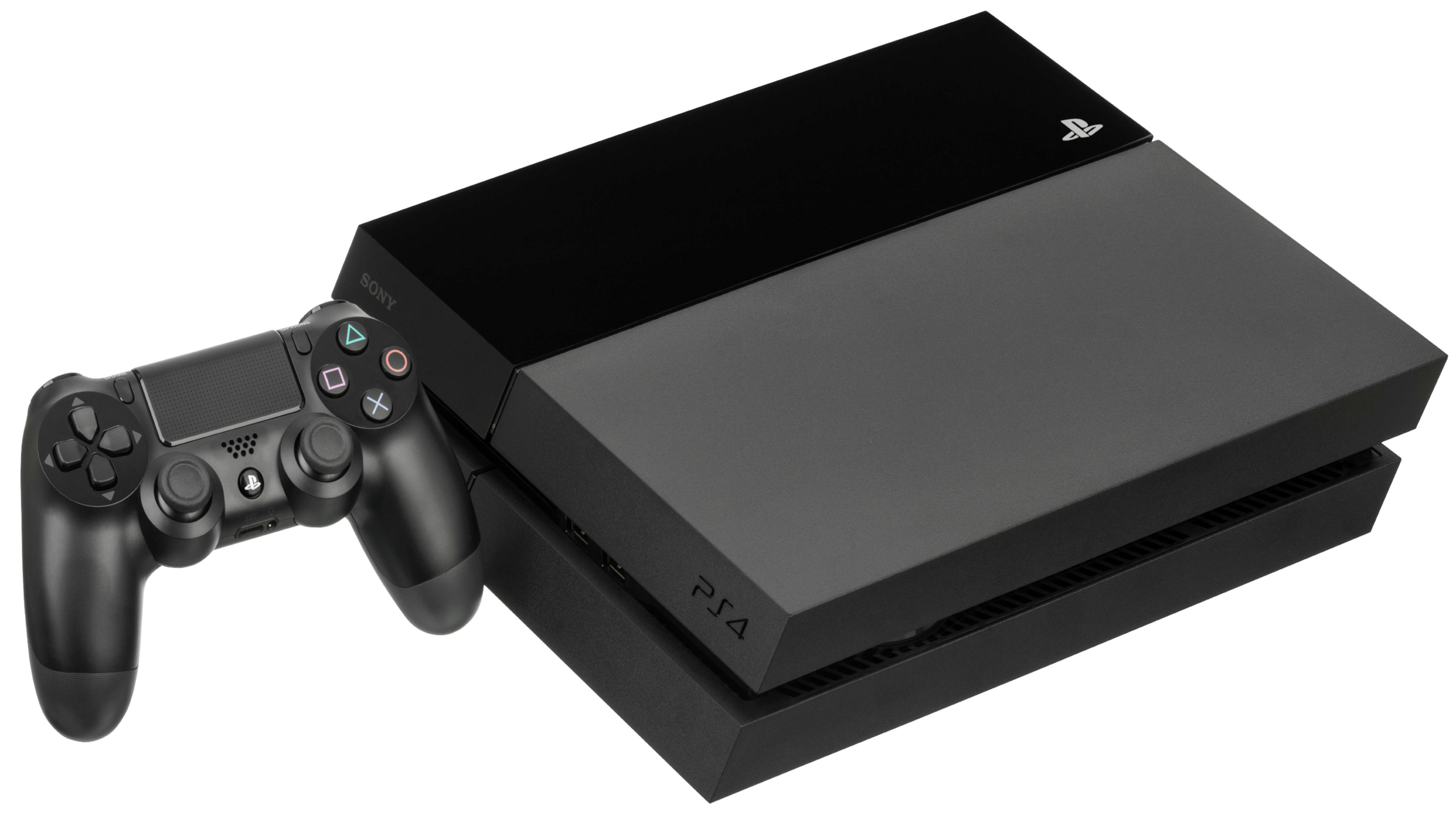 A sleek black PlayStation 4 console lies on a white surface with a matching PlayStation wireless controller placed next to it.