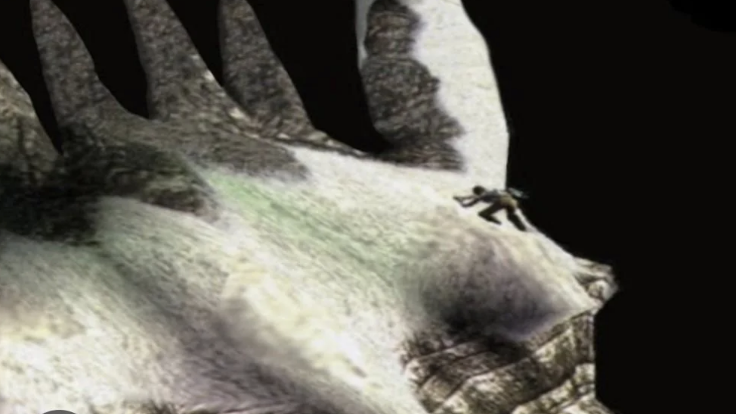 A small figure climbs the massive, rocky hand of a giant creature against a dark background, evoking the suspense and adventure of a video game.